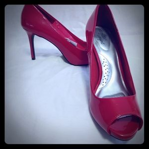 Red patent peep toe heels